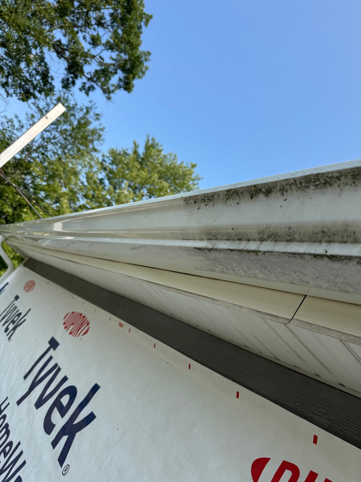 Seamless gutters installed along a roofline
