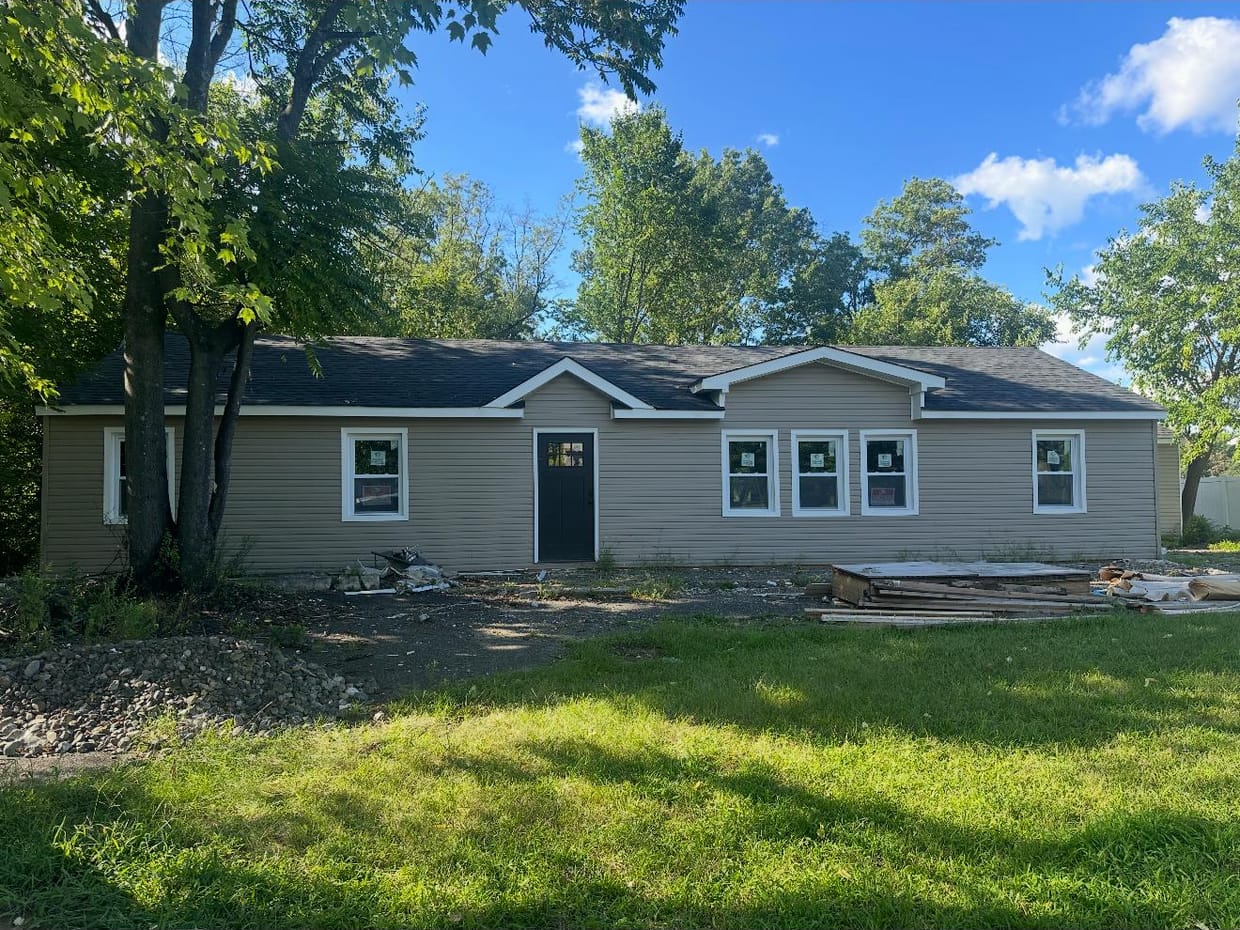 Fresh fiber cement siding on a home exterior
